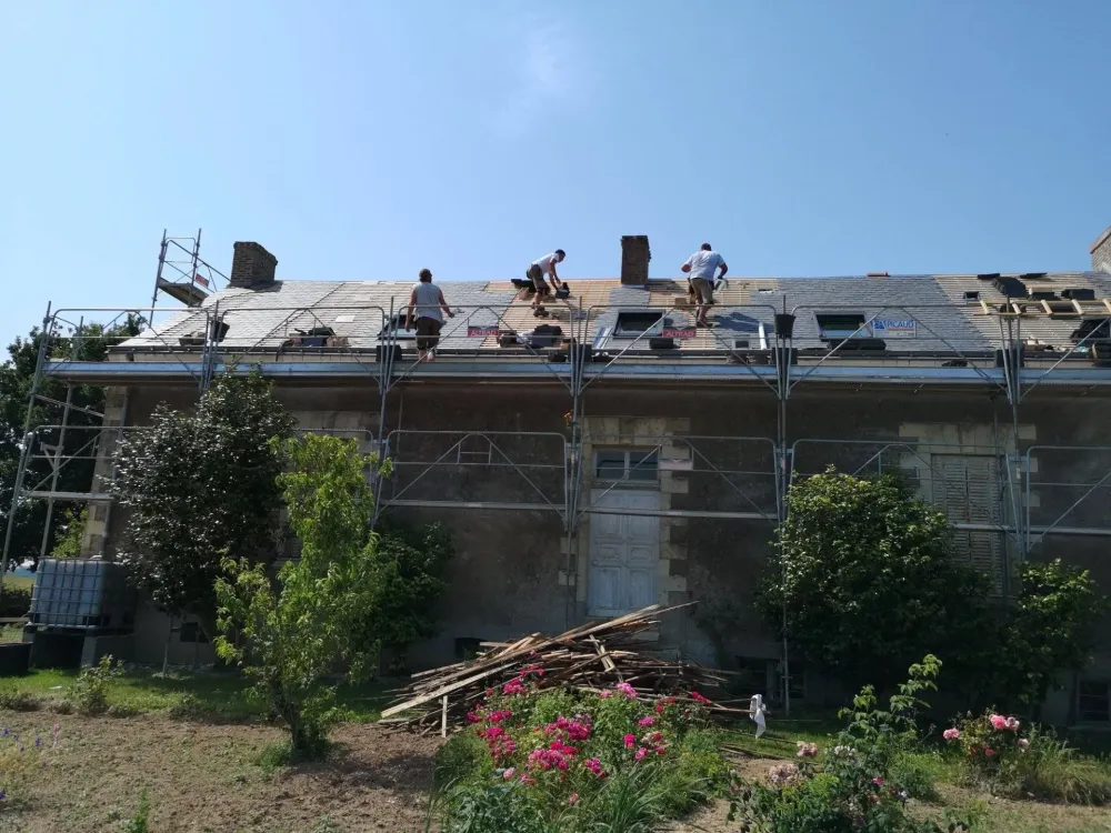 isolation de toiture à Les Touches